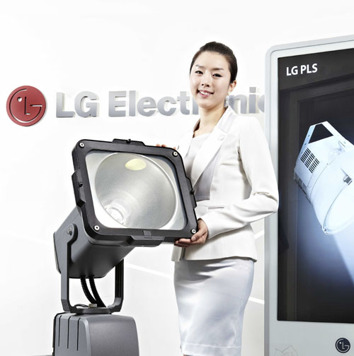 LG LED Lighting Solution_Korea Energy Management Corporation A woman poses holding LG’s Plasma Lighting System (PLS) product in front of LG Electronics' logo