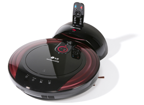 LG HOM-BOT_Front View Top view of the LG HOM-BOT smart vacuum cleaning robot in its docking station with its remote-control