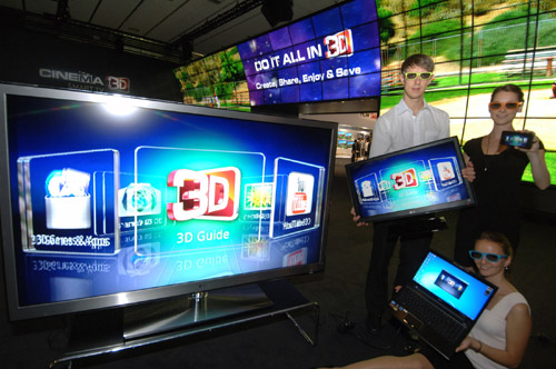 LG DO IT ALL IN 3D_IFA 2011 (1) A picture of LG's diverse lineups shown at IFA 2011 including TVs, monitors, mobiles, and laptops with models