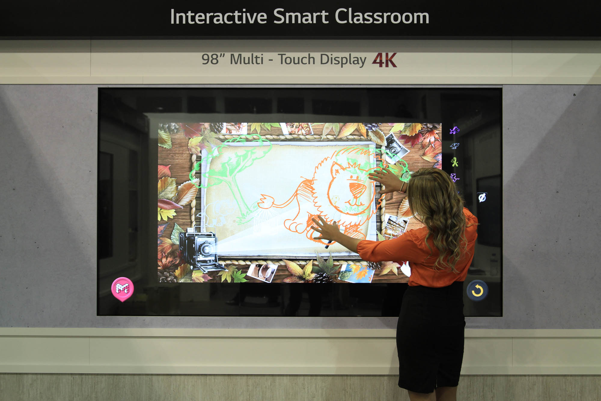 A model demonstrating LG’s 98-inch ULTRA HD Digital Signage at ISE 2015