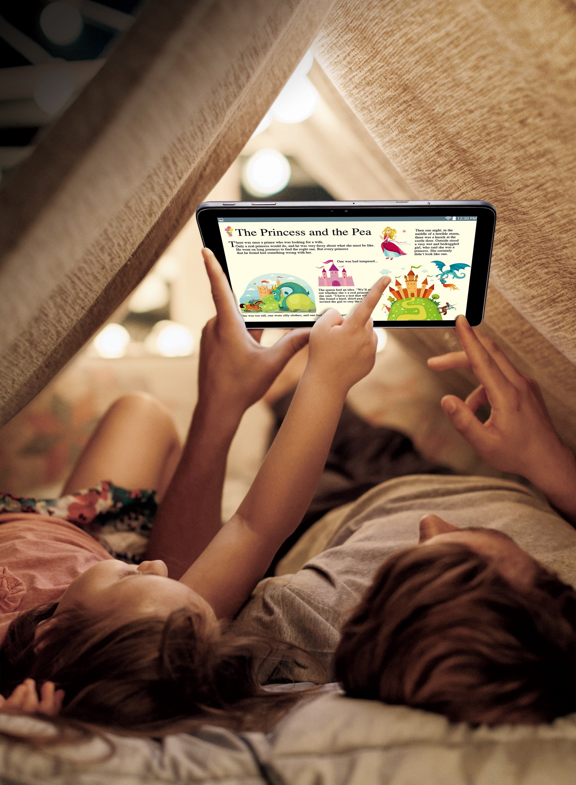 Two children lying in their bedroom tent while using LG Pad II 10.1, the boy holding the tablet as his sister points at pictures on the screen.