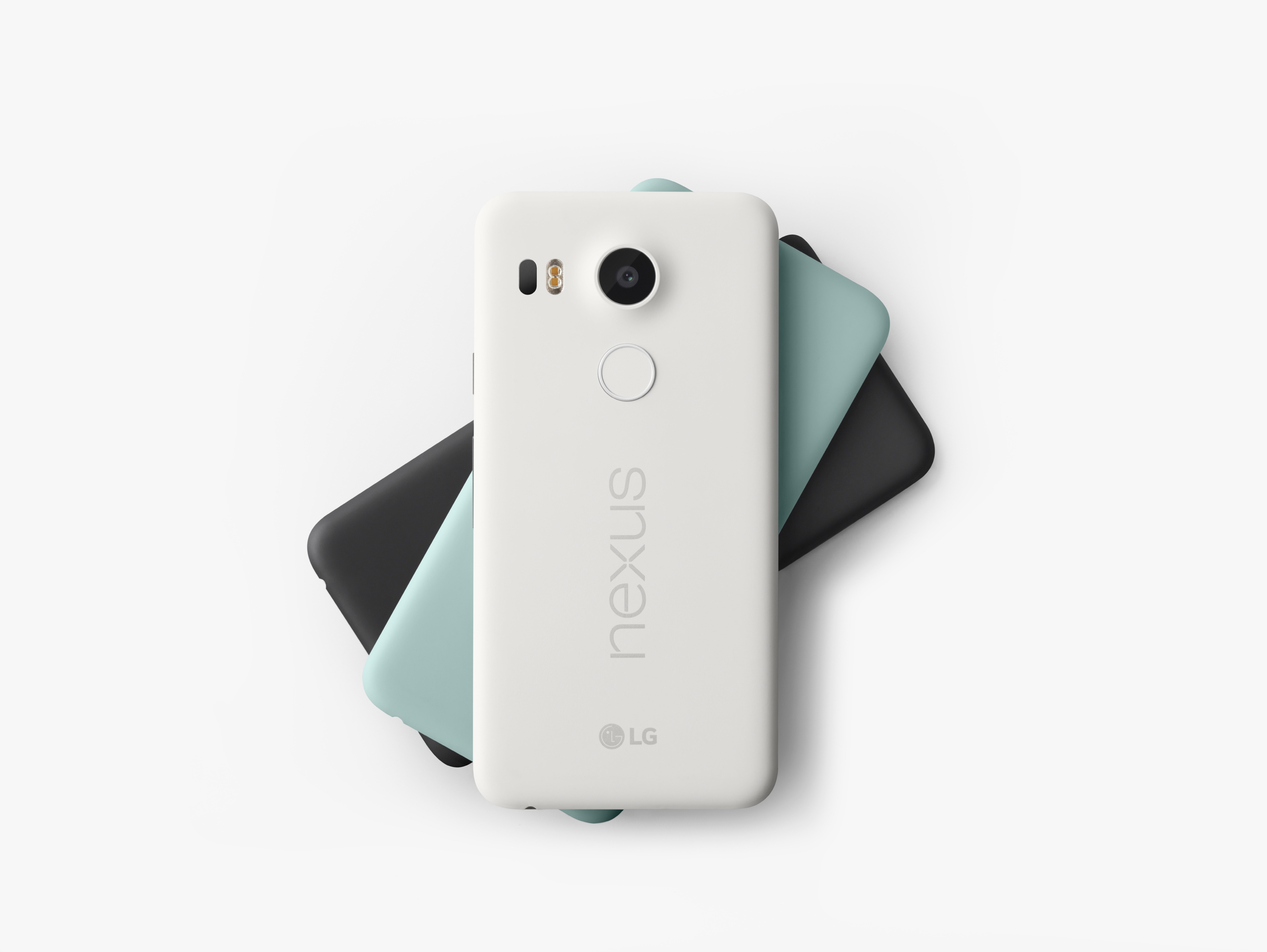 Back view of the Nexus 5X in Quartz White, Ice Blue and Charcoal Black placed on top of each other