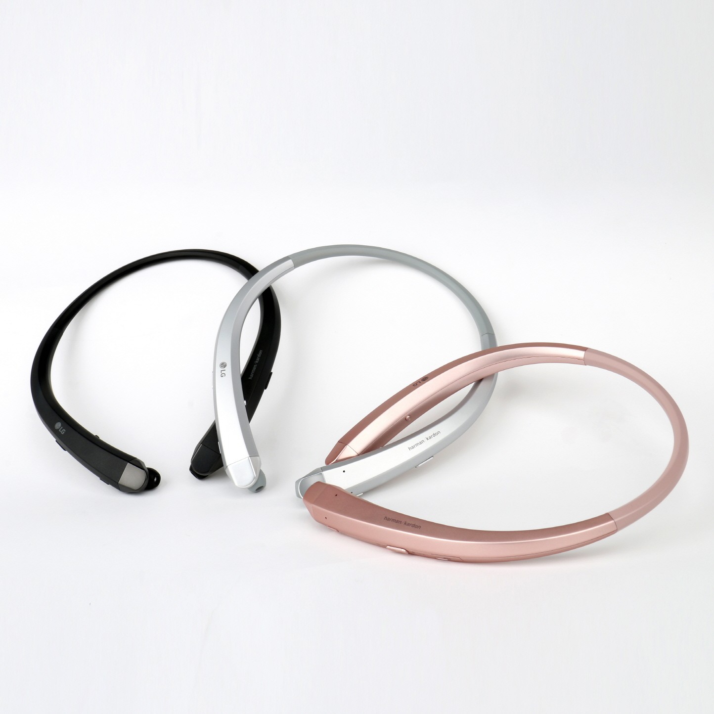 The top and side view of the LG TONE Infinim™ in Black, Silver and Rose Gold