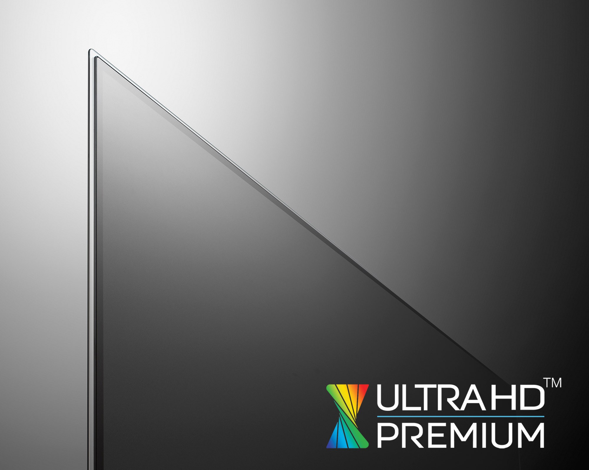 A close-up of the upper left corner of the LG OLED TV with the ULTRA HD PREMIUM logo displayed at the bottom right