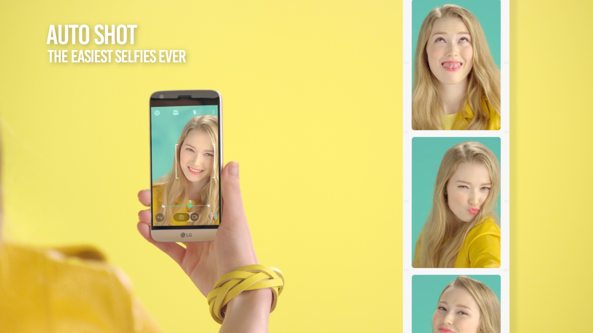 A girl takes selfies with the LG G5’s Auto Shot feature