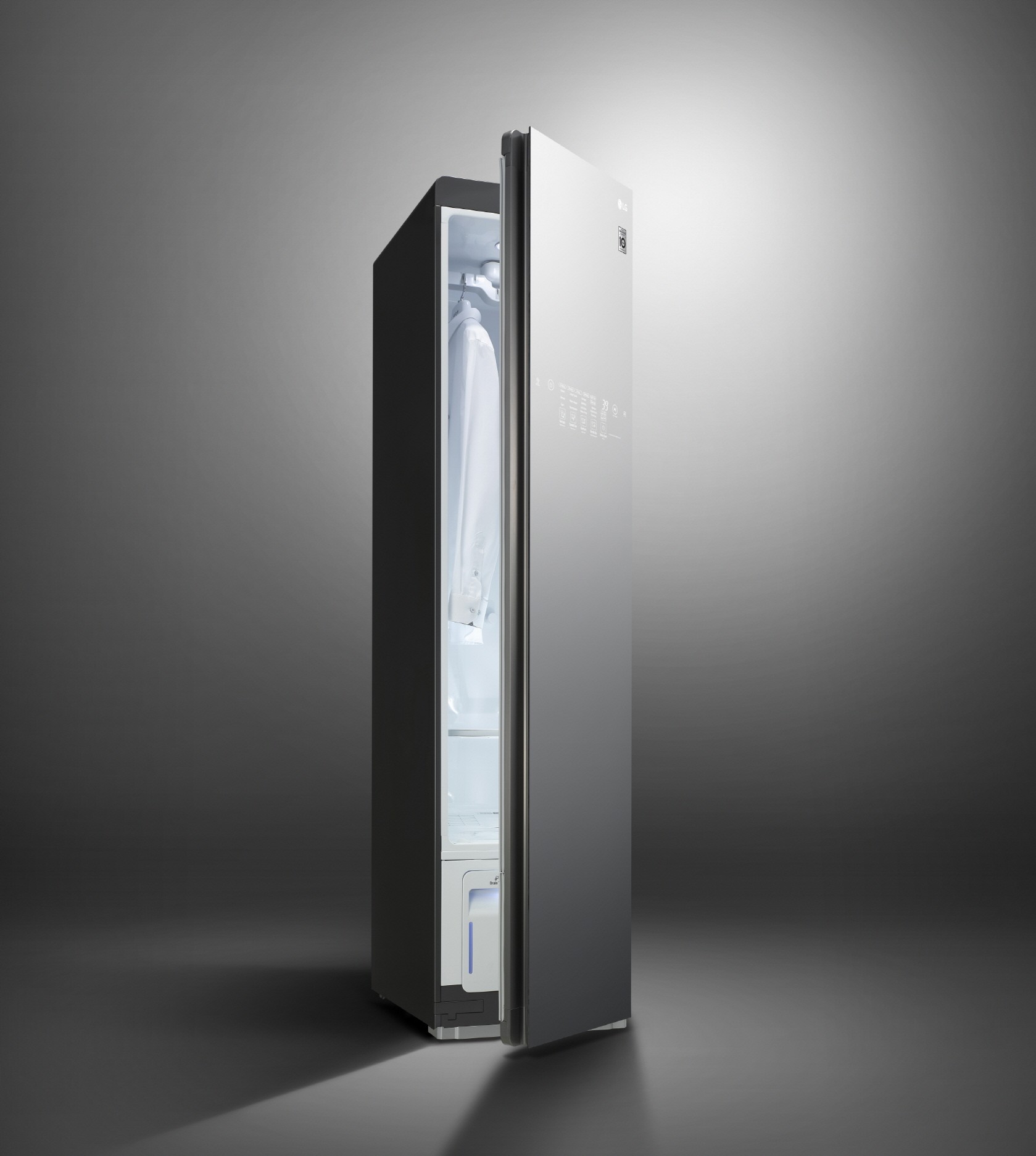 LG Styler with Black Tinted Mirror Glass Door slightly open to show a white collared shirt hanging inside