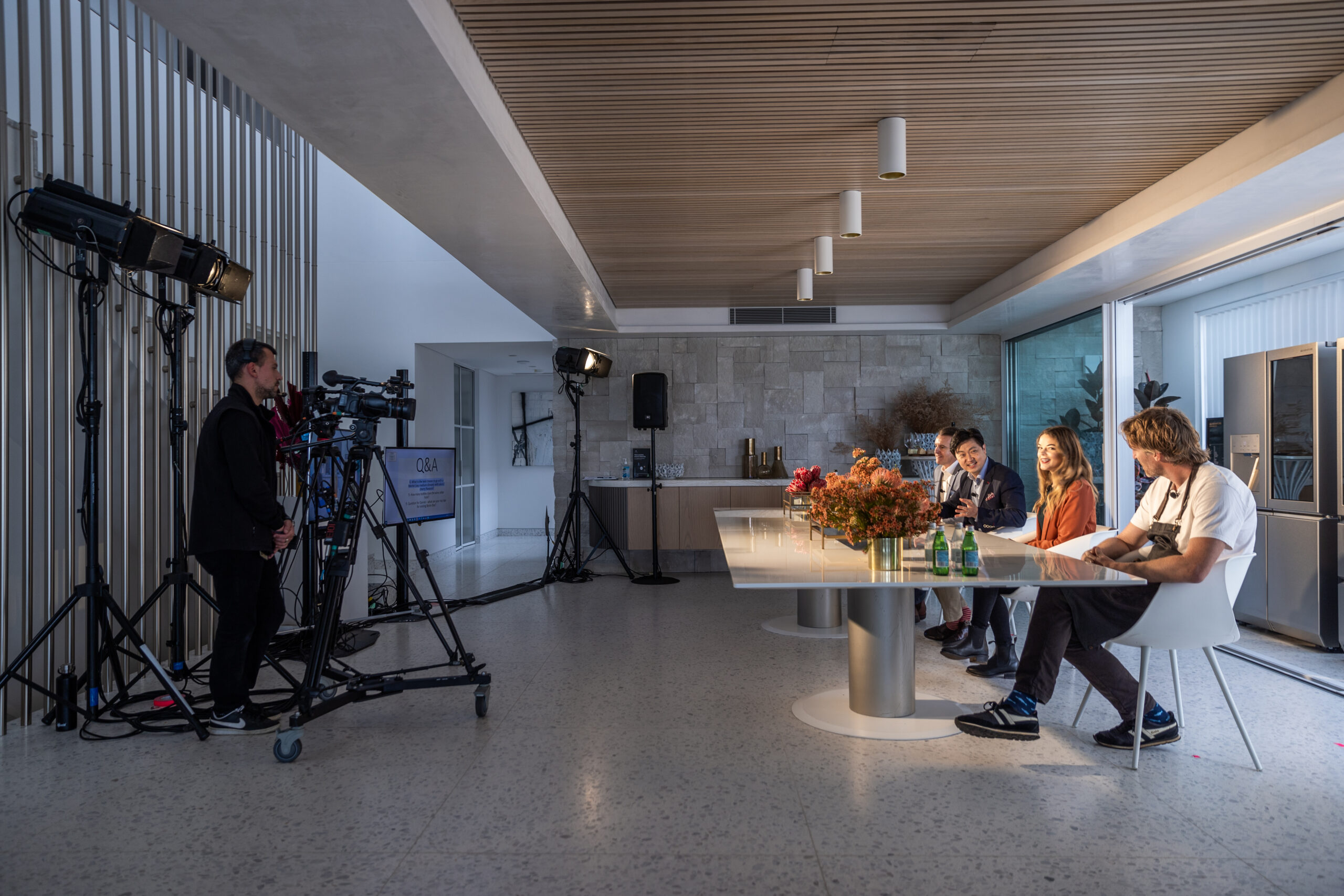 A production team filming Chef Darren Robertson and his co-hosts for the LG SIGNATURE Wine Cellar virtual launch experience in Australia