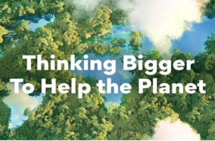 An Aerial Photo of a forest with lakes representing the world’s continents and the phrase "Thinking Bigger To Help the Planet" overlapping.